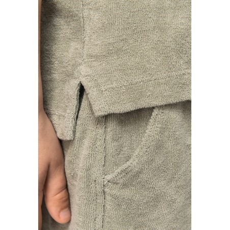 Polo ecorresponsable de rizo niño